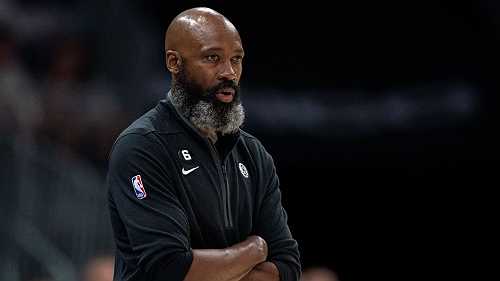 KU adds former star player Vaughn to Self's staff