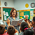 Poetry: In a classroom bright with eager eyes, A teacher stands, where knowledge flies, Her voice, a...